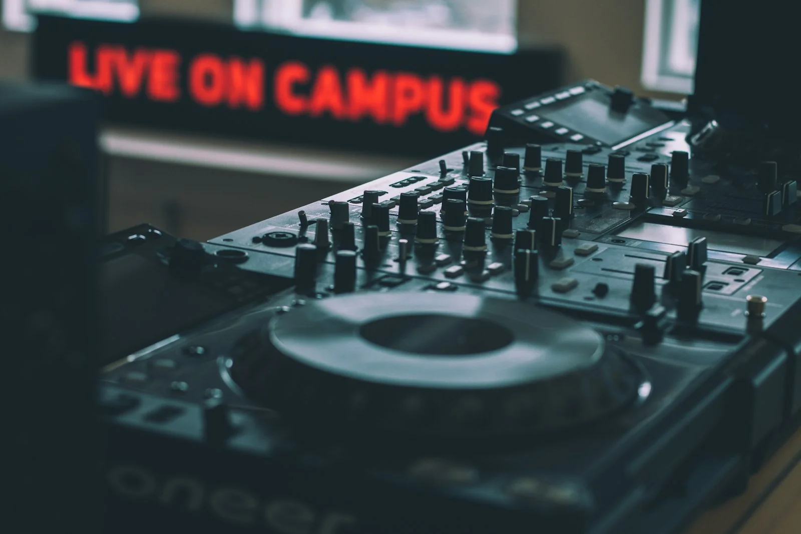 selective focus photography of DJ controller selective focus photography of DJ controller
